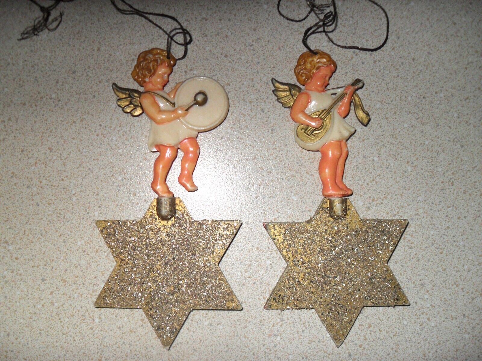 Vintage Germany Made Celluloid Plastic Angel Band Ornaments on Mica Glitter Star