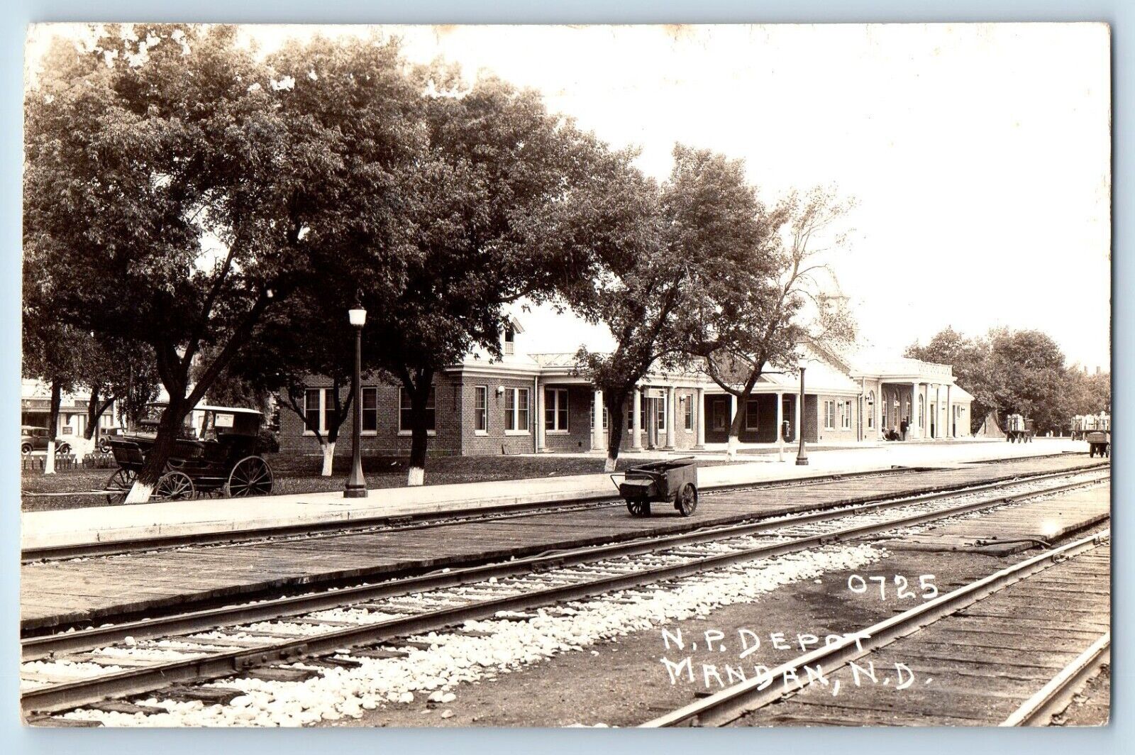 Mandan North Dakota ND Postcard RPPC Photo NP Depot Wagon Railroad Train c1940s