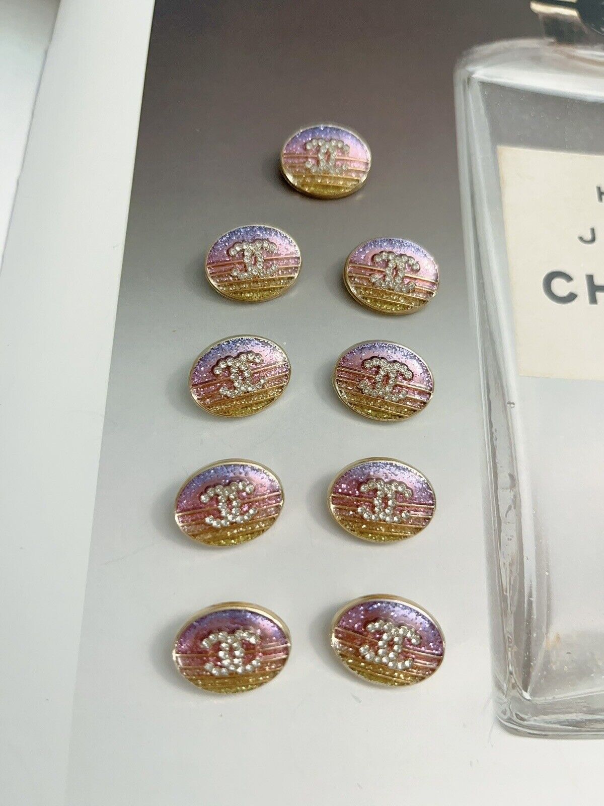 Lot of 9 Chanel buttons