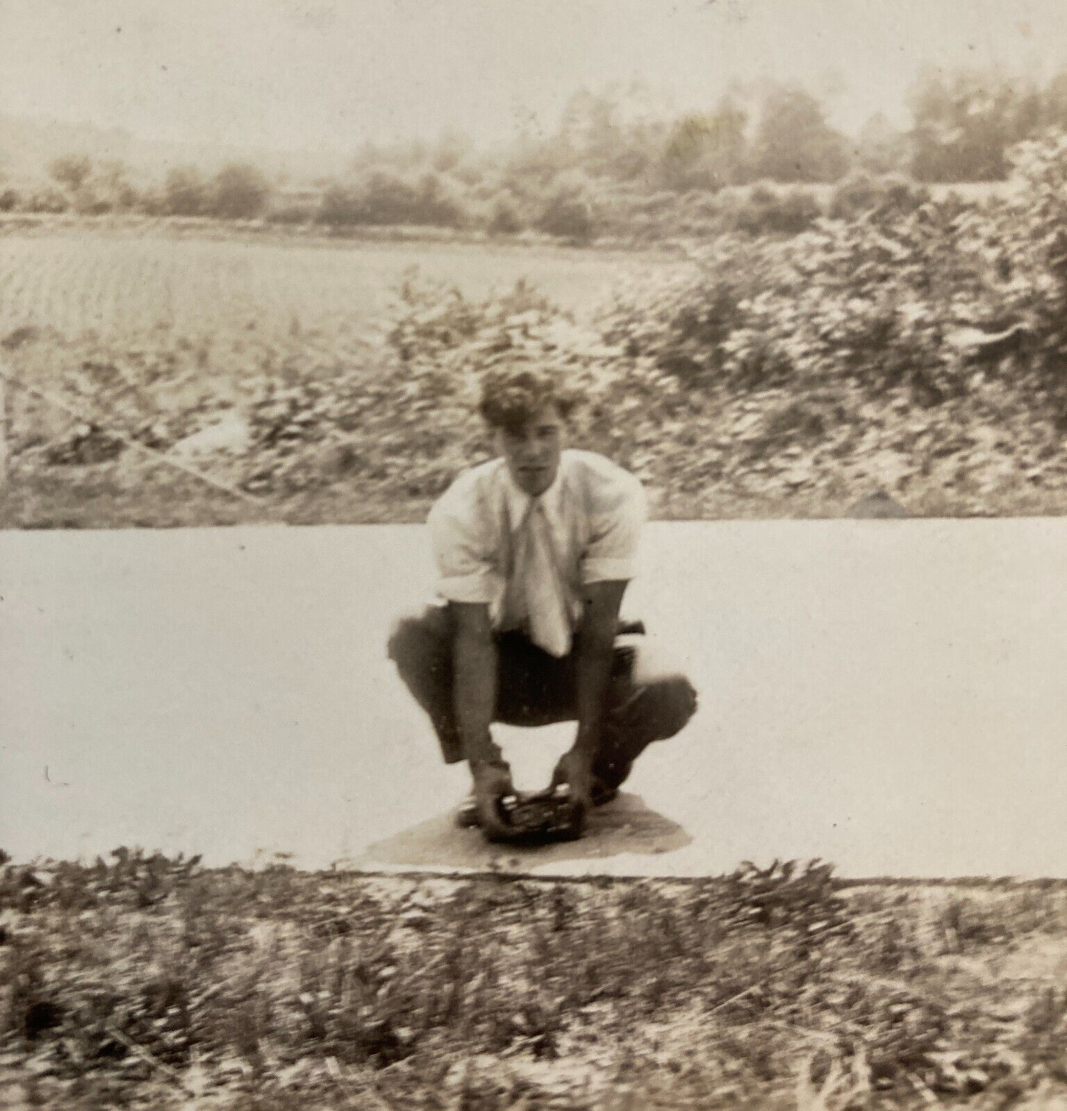 Vintage 1930s Photo Handsome Young Man Kneeling in Path with Camera