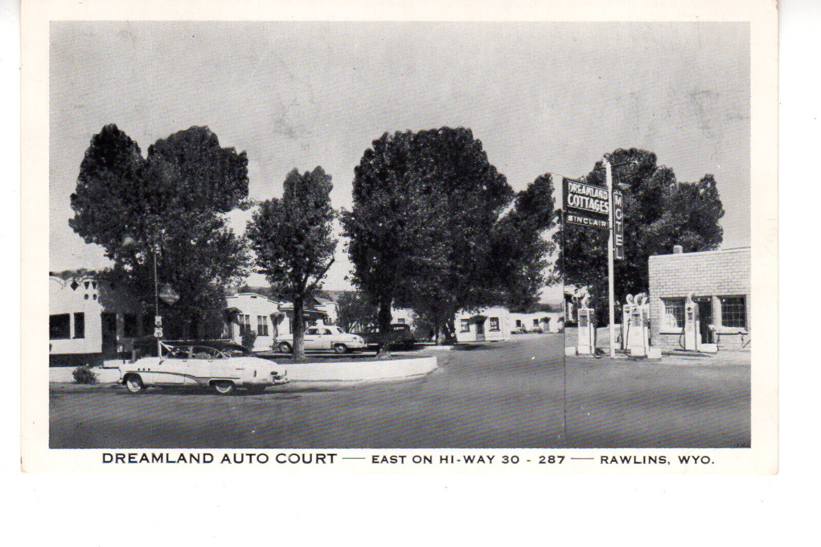 Postcard: Dreamland Auto Court, Rawlins, WY (Wyoming) - Roadside America; Globes