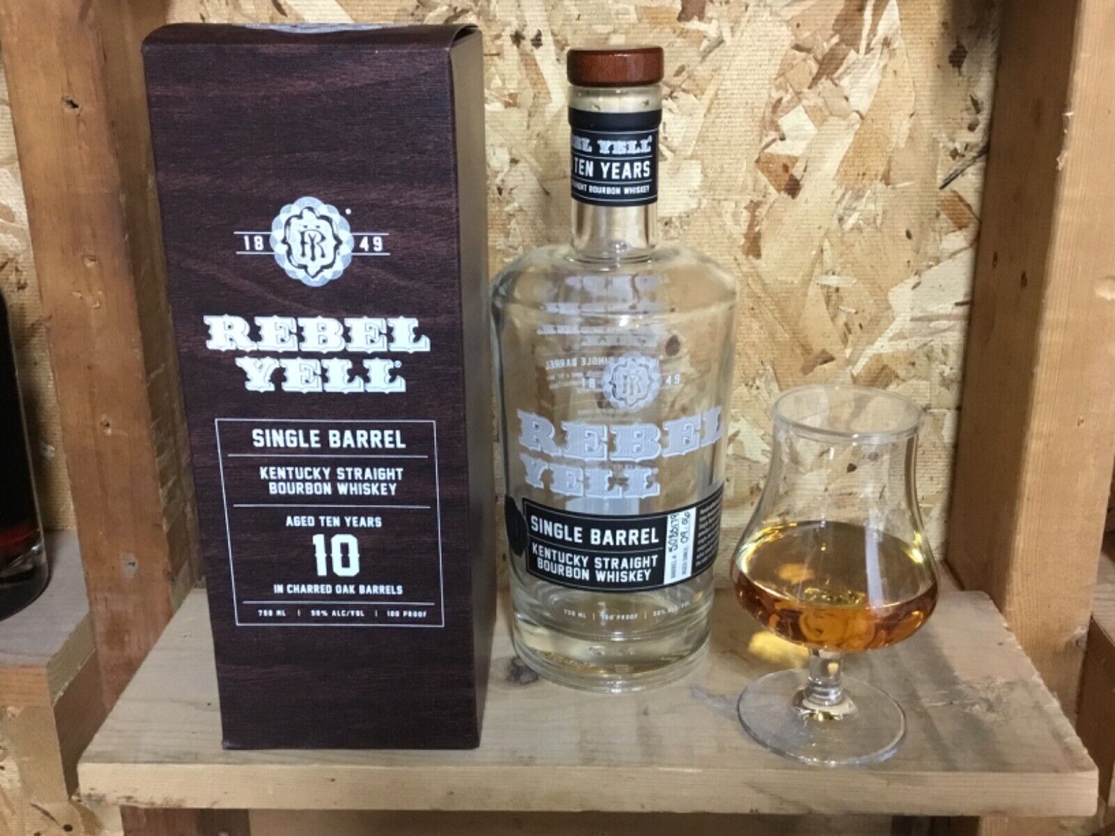 Empty Rebel Yell 10 yr Kentucky bourbon whiskey bottle and box
