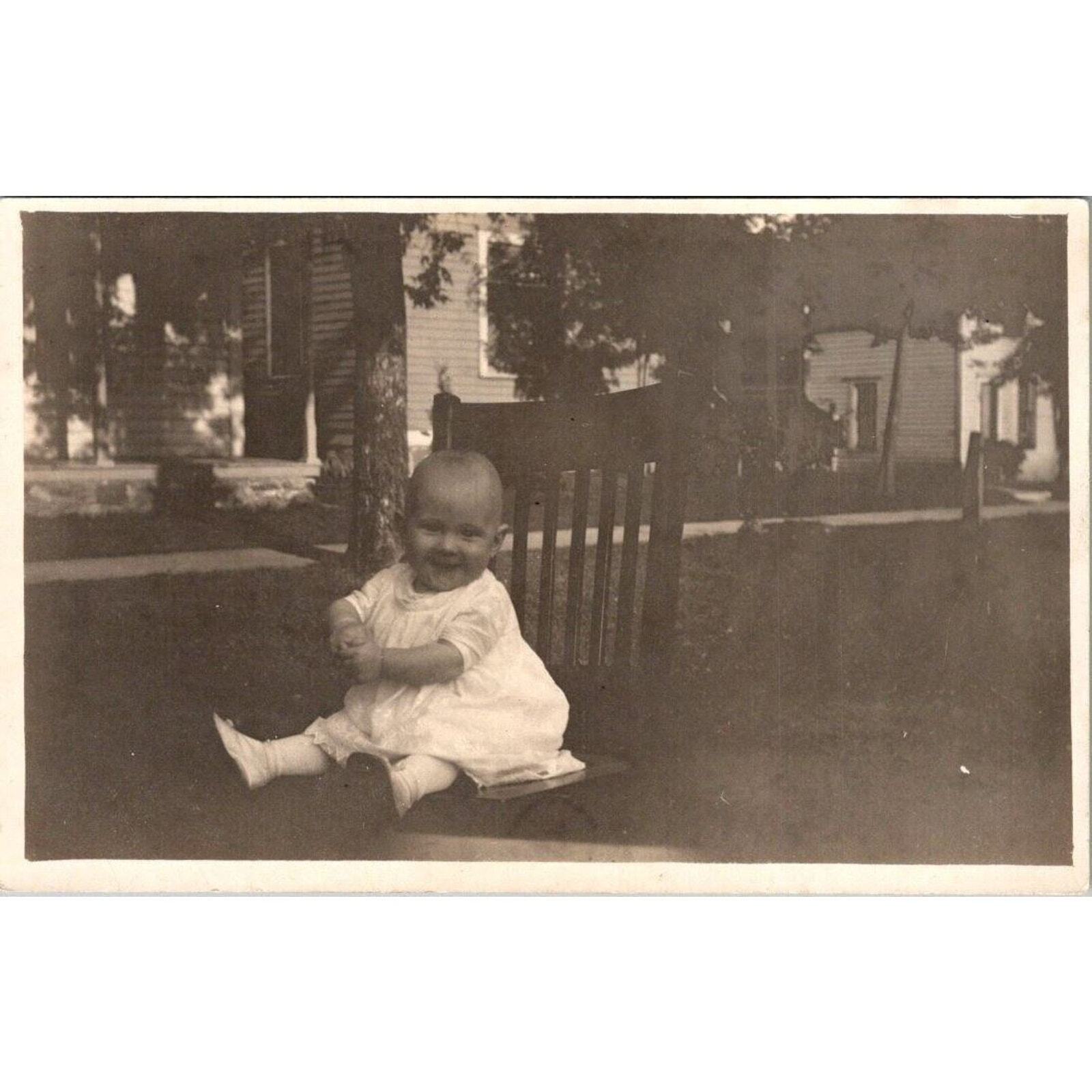 RPPC Baby Sitting on Chair Outside Smiling Vintage Postcard UnPosted Cyko