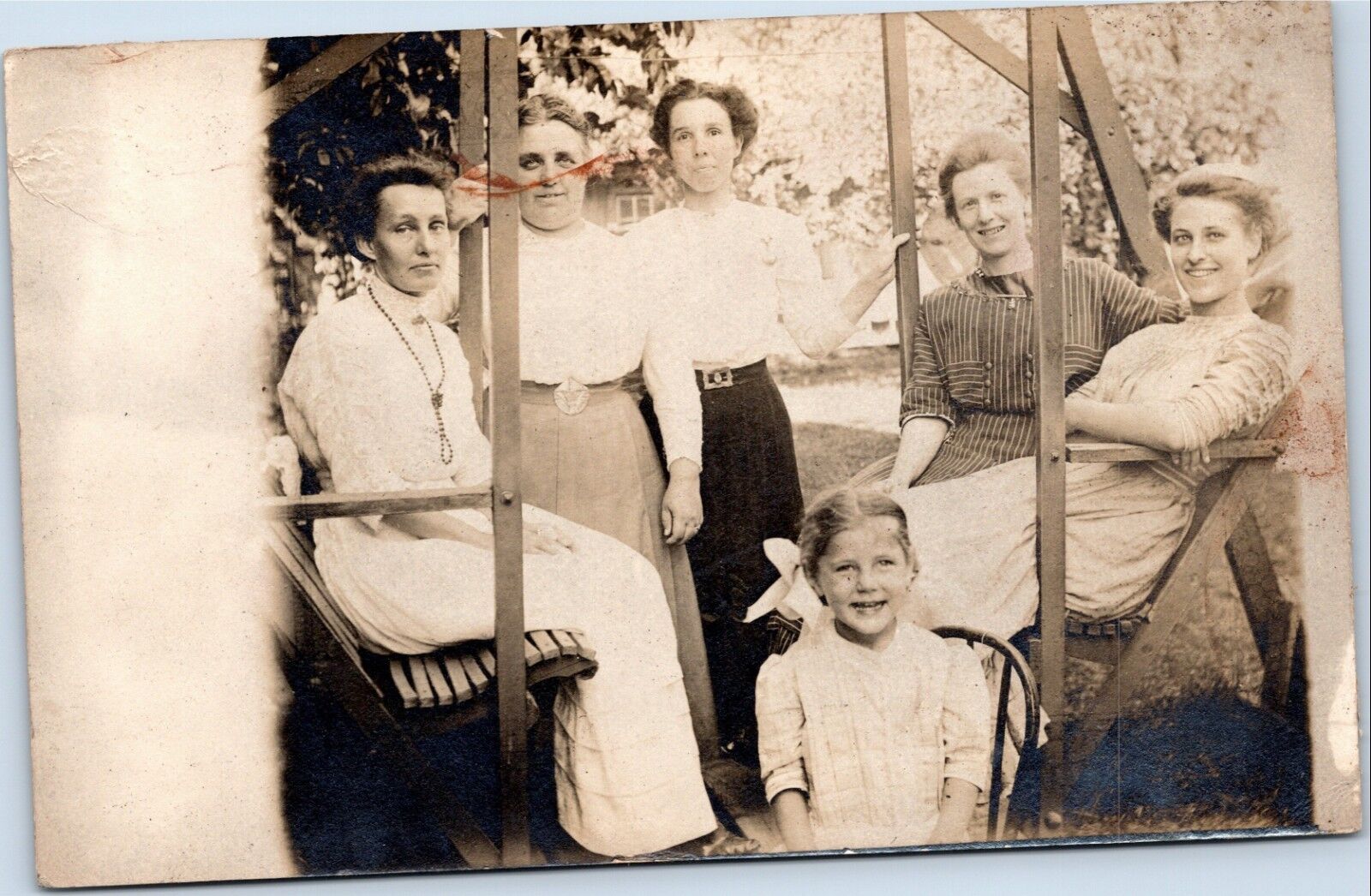 RPPC: Women and girls in swing c.1907-1914 velox
