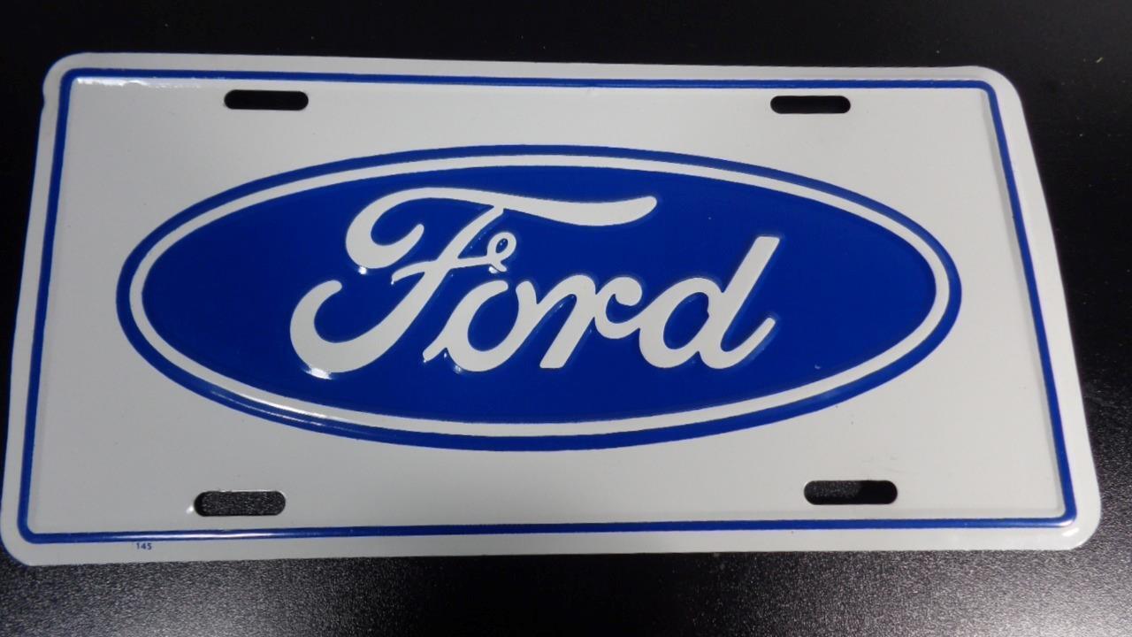 FORD BLUE OVAL LOGO ON WHITE ALUMINUM LICENSE PLATE NEVER DISPLAYED, NICE PLATE
