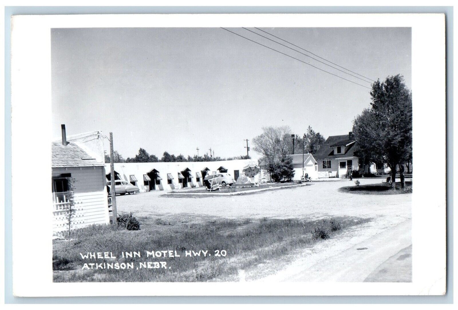 Atkinson Nebraska NE Postcard RPPC Photo Wheel Inn Motel Hwy 20 RPO Vintage