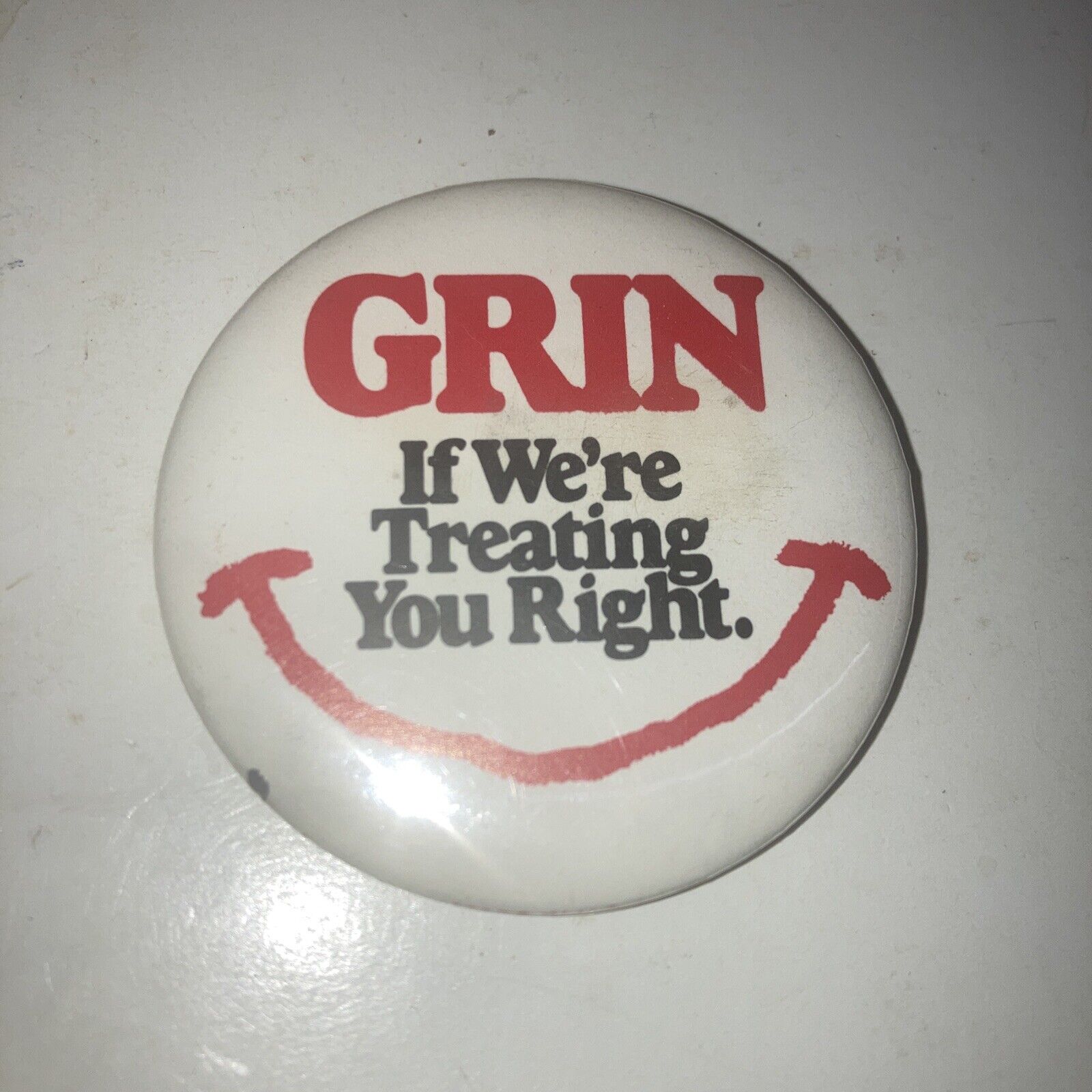 Grin If We Are Treating You Right Button