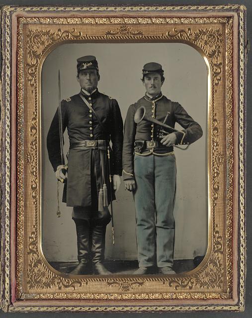 Photo:[Two unidentified soldiers with sword and saxhorn]