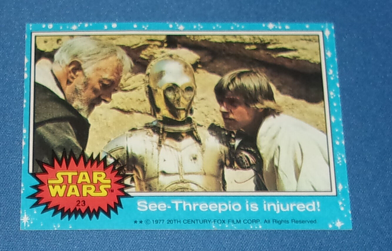 1977 Topps Star Wars Trading Card Series 1 Blue #23 See-Threepio is injured