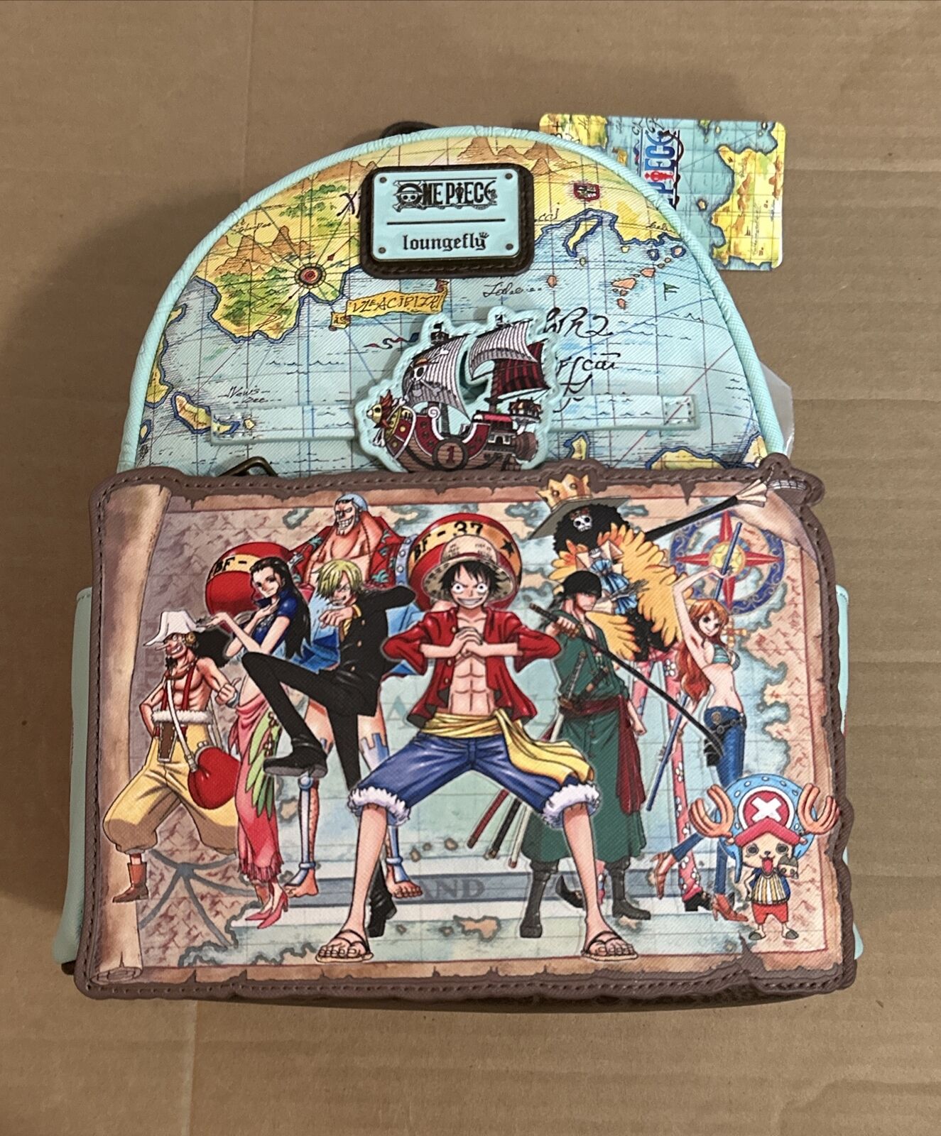Loungefly One Piece Luffy Gang Map Mini-Backpack In Hand