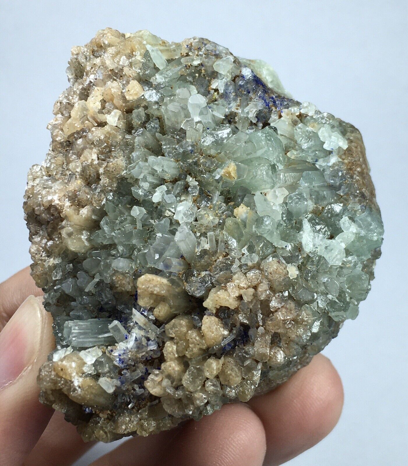 Bluish Green Aragonite crystals cluster with lazurite specs