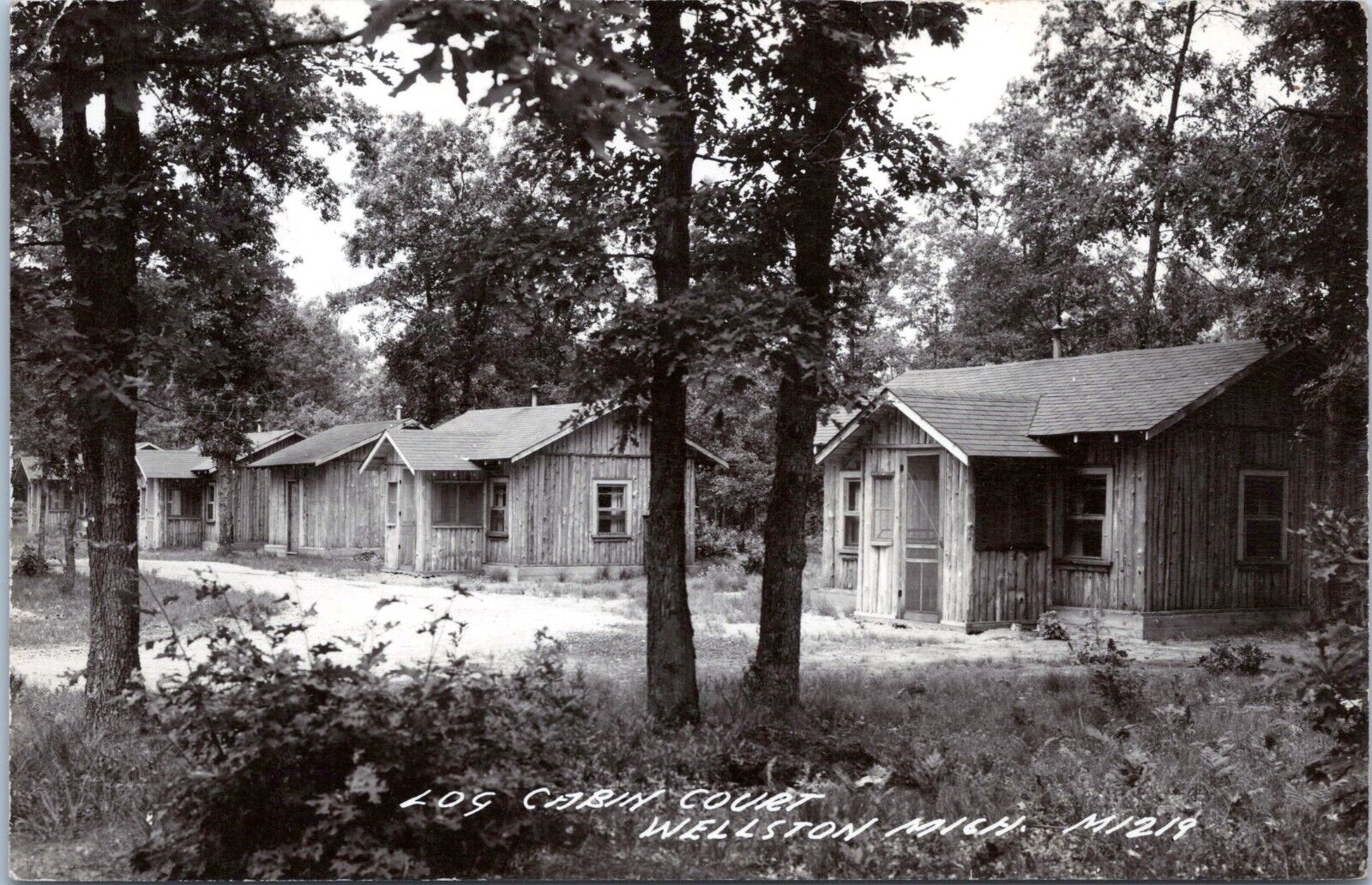RPPC Log Cabin Court, Wellston, Michigan - Photo Postcard