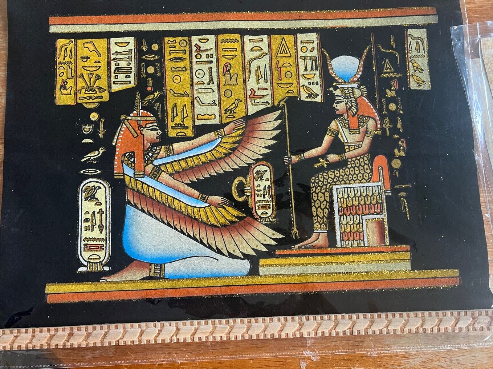 egyptian hand painted papyrus, changes to different painting, glows in the dark