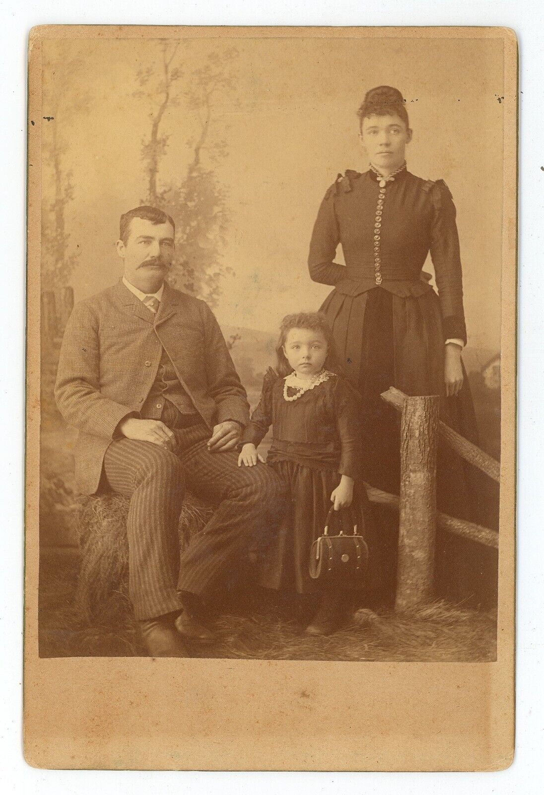 Antique c1880s Cabinet Card Lovely Family of Three.  Little Girl Holding Purse