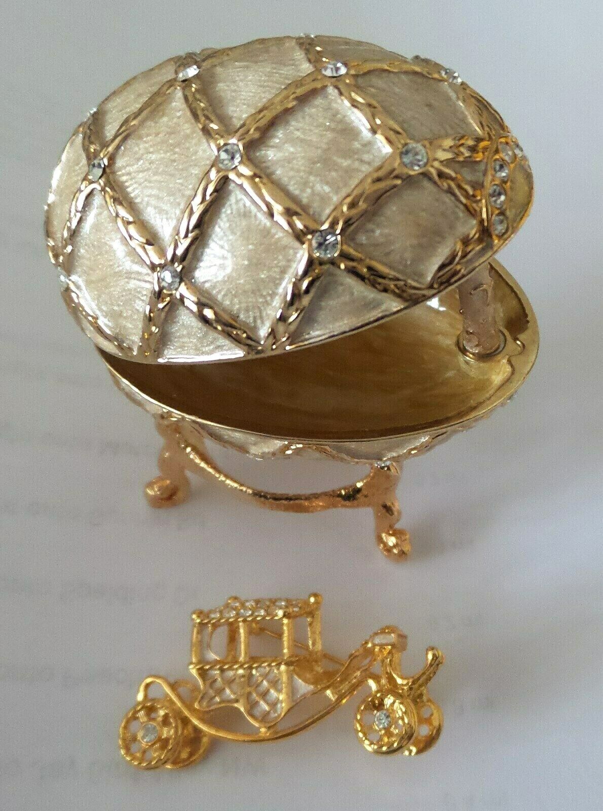 FABERGE EGG WITH CRYSTALS BOX ON STAND WITH GOLD CARRIAGE BROOCH