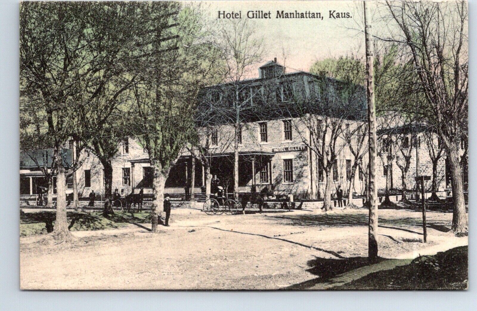 Postcard Kansas Manhattan Hotel Gillet Horse Drawn Vehicles Dirt Street