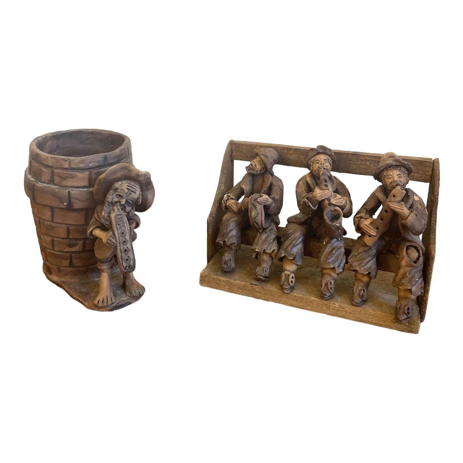 THREE MUSICIANS FIGURINES ON WOODEN BENCH AND CERAMIC POT WITH MUSICIAN PLANTER