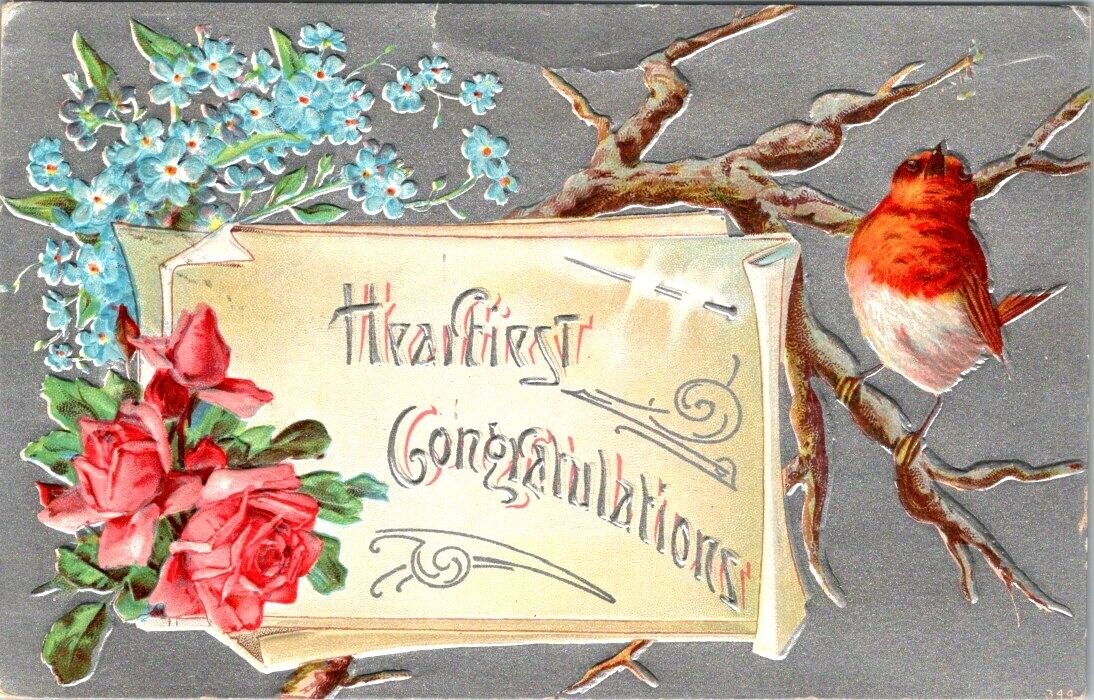 vintage postcard- HEARTIEST CONGRATULATIONS - bird with flowers embossed 1909