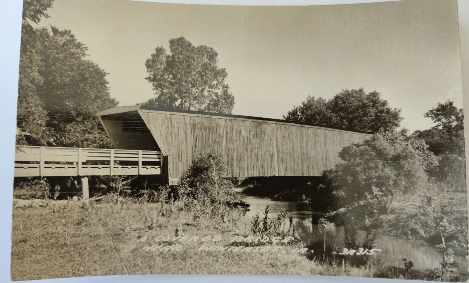rppc 1950\'s covered bridge near Winterset Iowa
