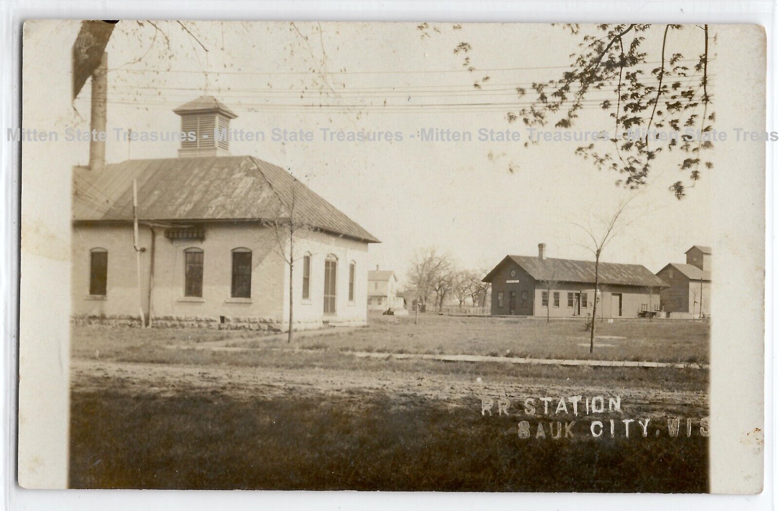Railroad train station depot, Sauk City, Wisconsin; photo postcard RPPC %