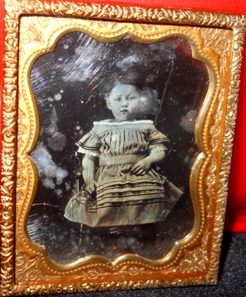 1/9th Size Daguerreotype of young girl in brass mat/frame