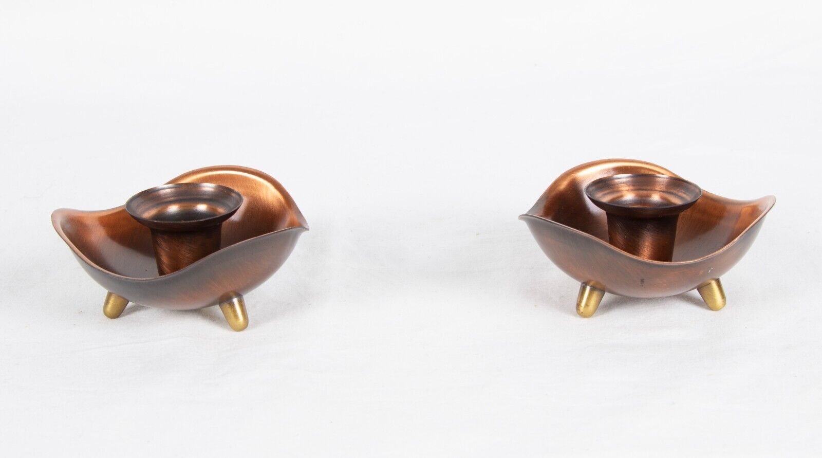 Pair of copper candle holders, from Coppercraft Guild