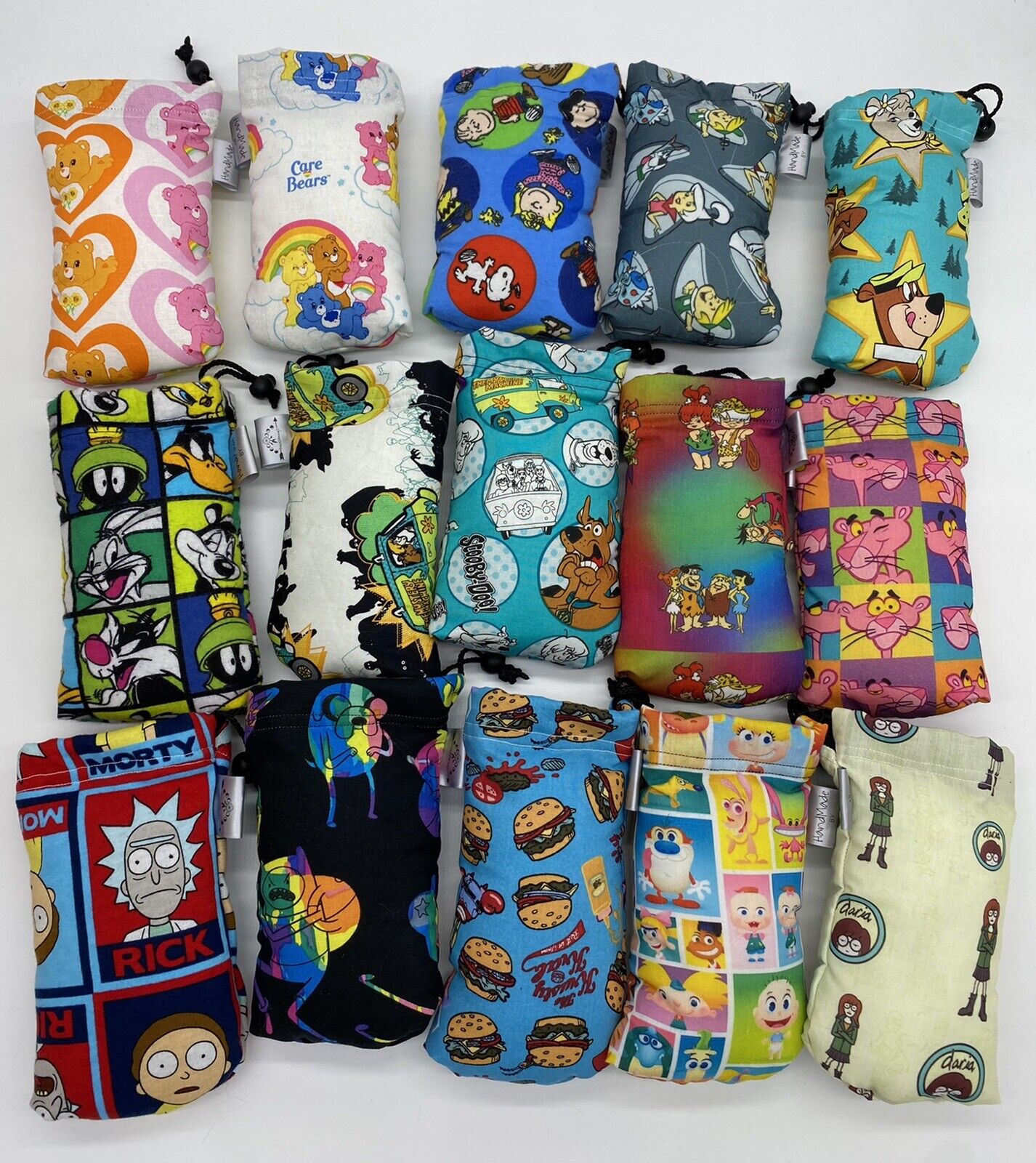lot of 50 Assorted Print pipe bags padded 7x4 drawstring pouches