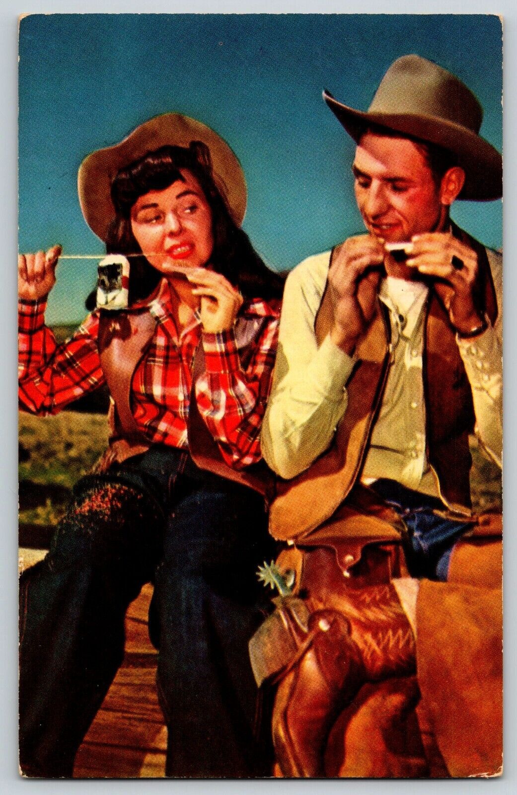 Postcard Cowboy & Cowgirl Rolling a Cigarette