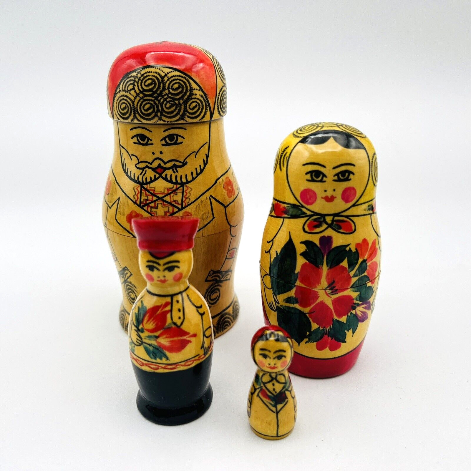 Russian Wooden Hand Painted Nesting Dolls 4 Pieces Family Made in USSR Vintage