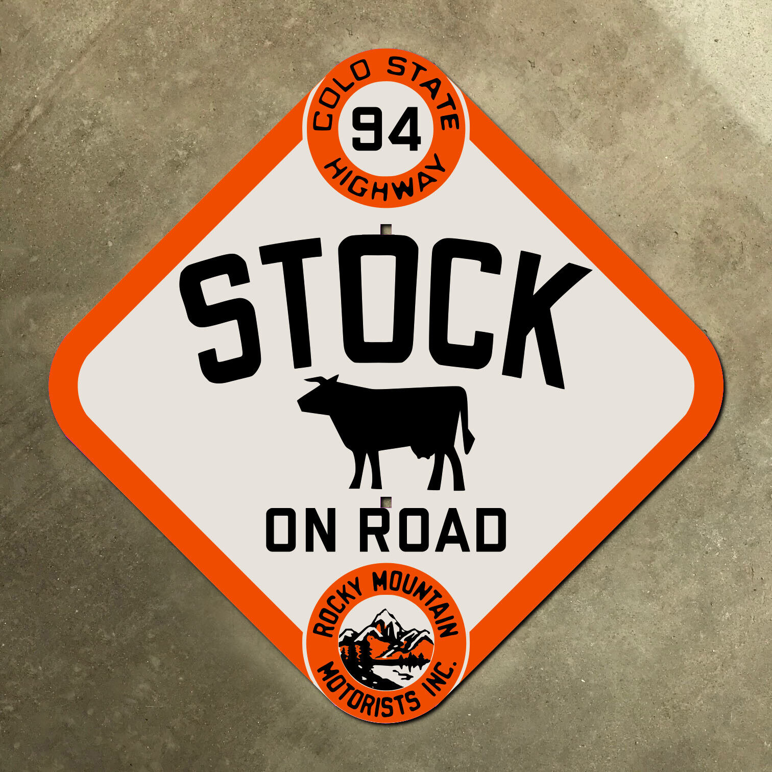 Colorado Rocky Mountain Motorists state highway 94 stock warning road sign cow
