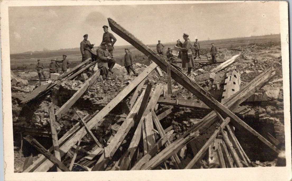 WW1 soldiers standing amoung ruins RPPC postcard a20