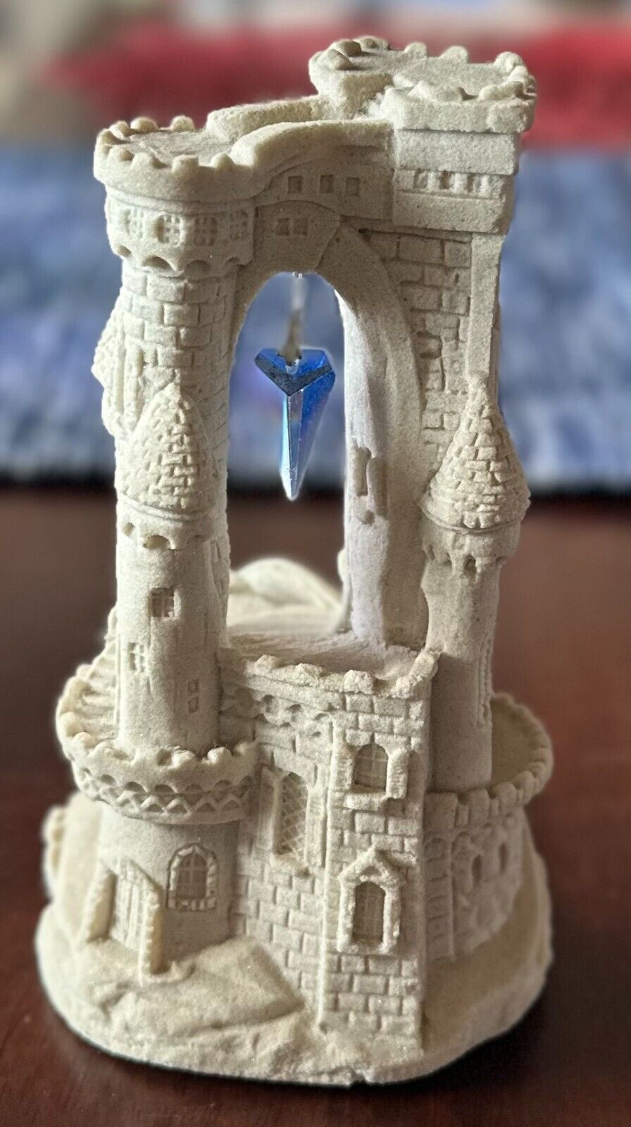 Mr. Sandman Sculpture with Blue Crystal hanging from arch 6\