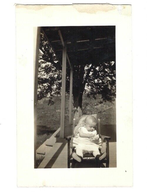 c1910s Cute Baby In Rocking Chair On Porch RPPC Real Photo Postcard