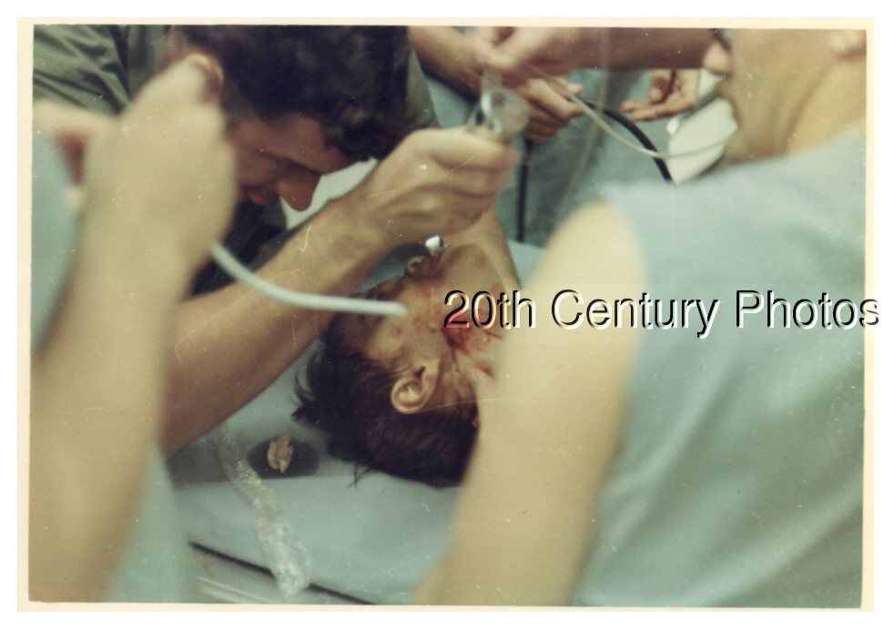 FOUND COLOR PHOTO J+7057 VIEW OF MAN IN SURGERY
