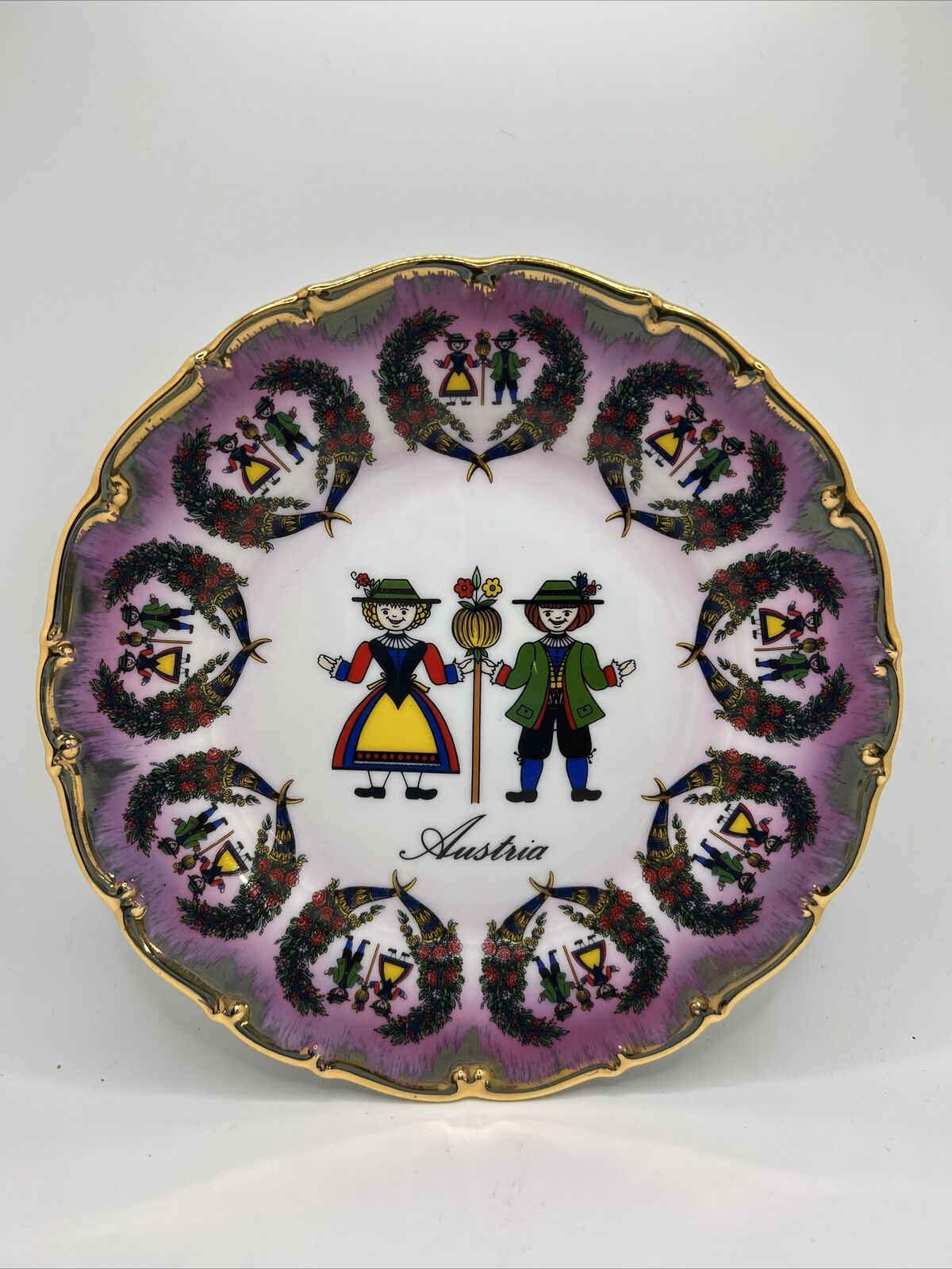 Austria Decorate Plate boy girl national costume gold rim 7 1/2 inches