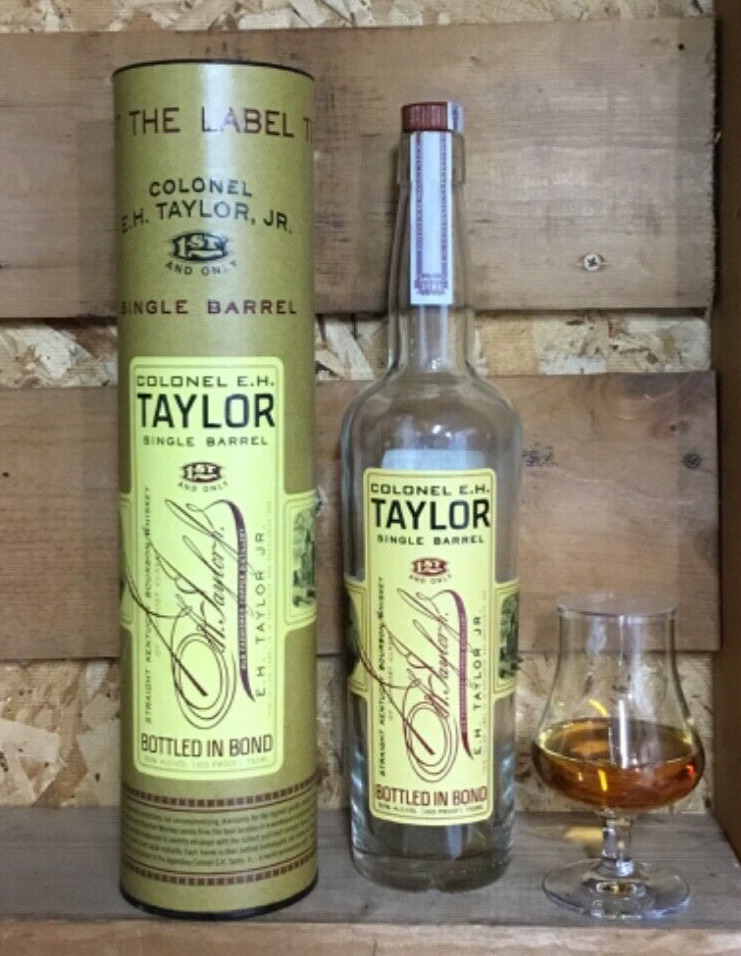 Empty E.H. Taylor Kentucky bourbon single barrel whiskey bottle and tube
