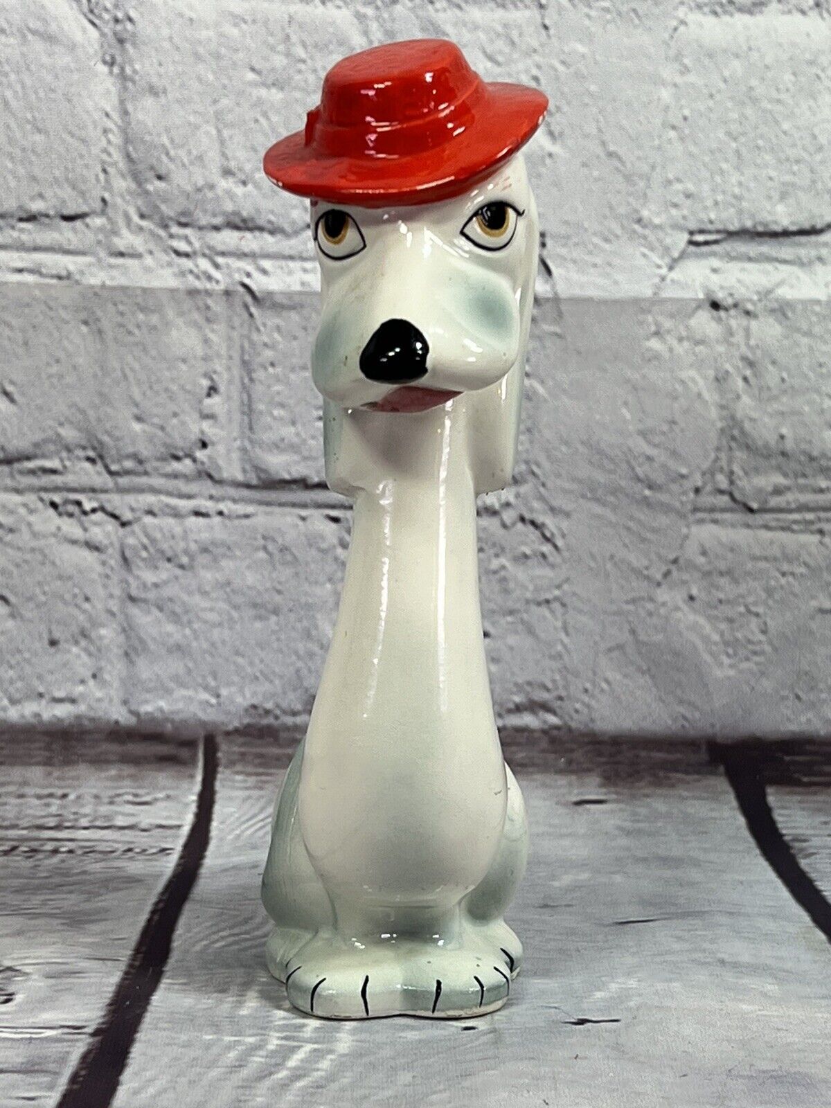 vtg  Made in Japan dog figural with red hat candle or tooth pick holder 7\'\' tall