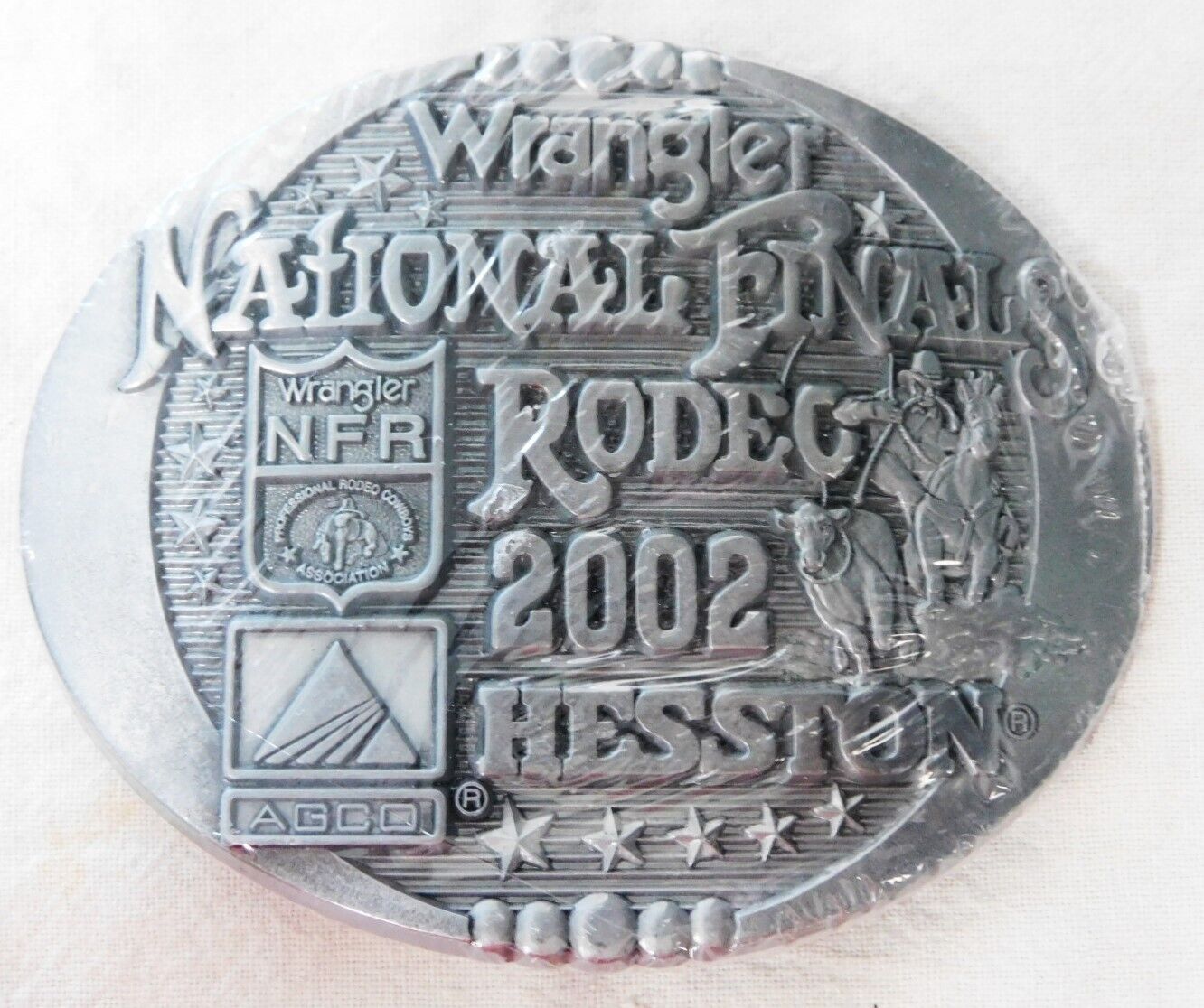 NOS 2002 HESSTON NATIONAL FINALS RODEO BELT BUCKLE - ORIGNINAL WRAPPER