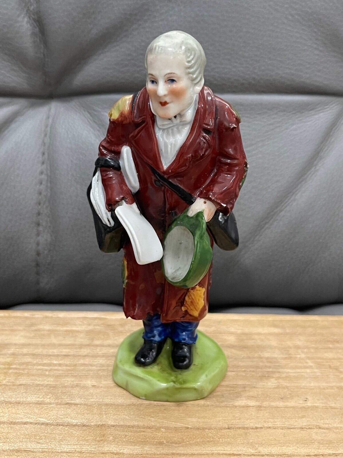 Antique German Kister Porcelain Figurine Man Carrying Papers Newspapers