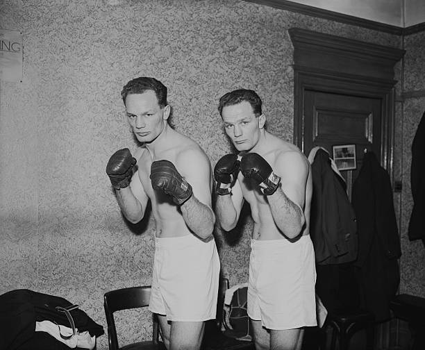 boxer Henry Cooper and his twin brother George , during a tr - 1958 Old Photo 2