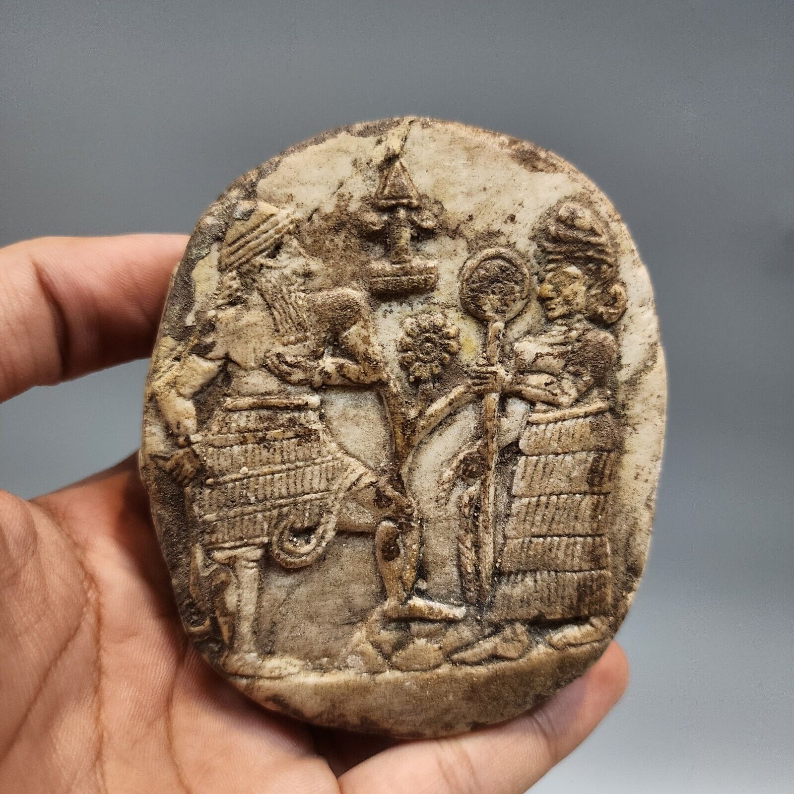 AN IMPORTANT ASSYRIAN ALABASTER STONE PLAQUE WITH STORY SCENES.
