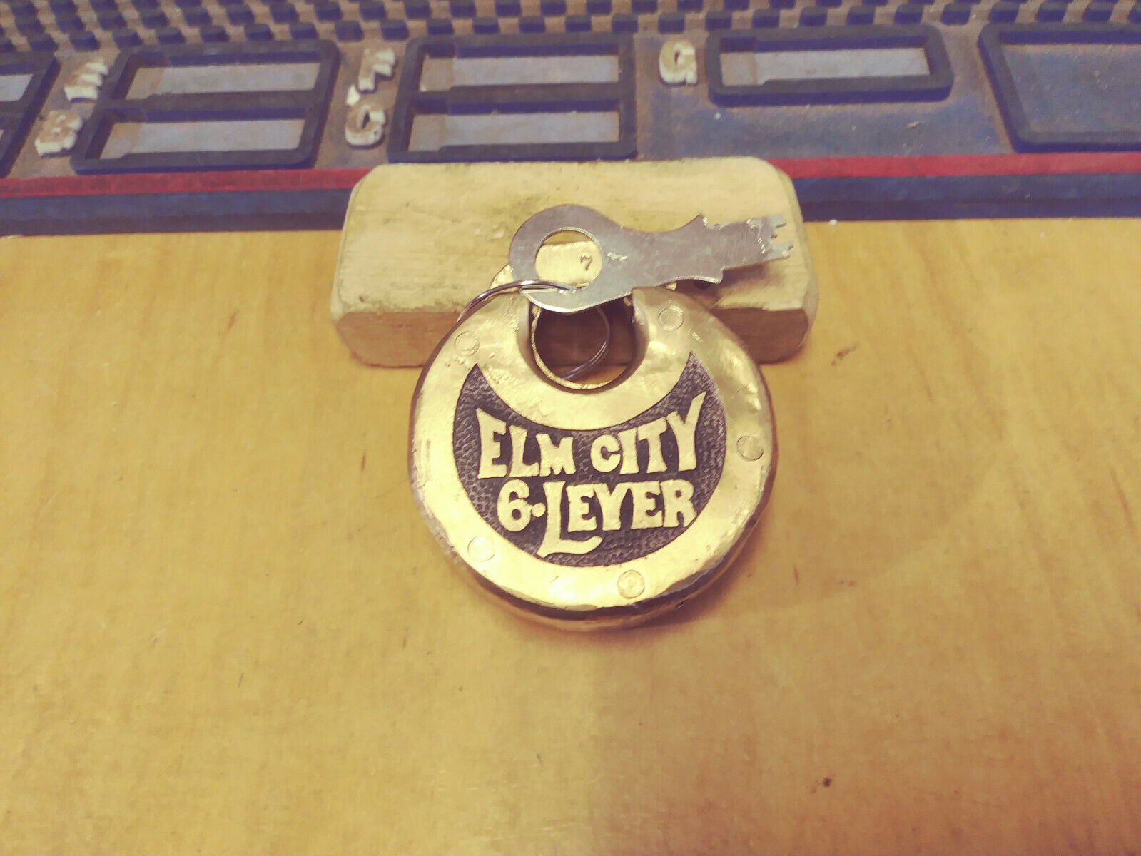 antique/vintage ELM CITY  6 lever push key pancake padlock  7