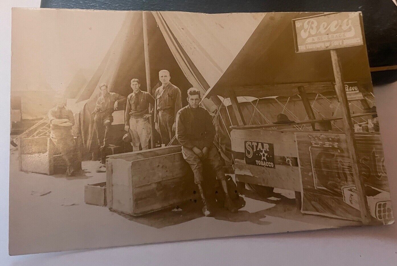 C.1917 WW1 RPPC Soldiers Tent Store STAR  Tabacco,BEVO Soft Drink Cigarette Ads