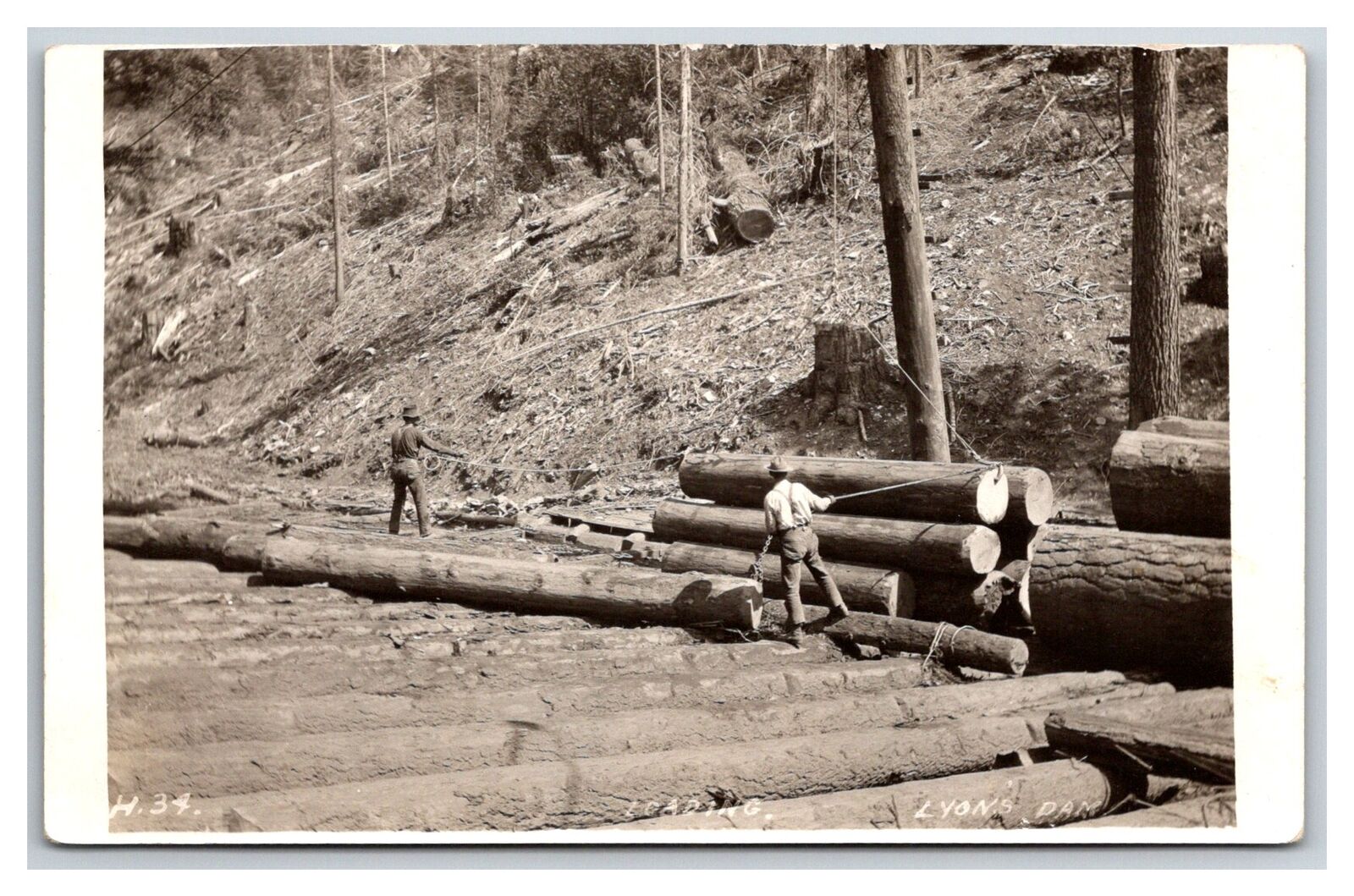 TWAIN HARTE California RPPC~ Lumberjacks moving logs at Lyons Dam 1910c