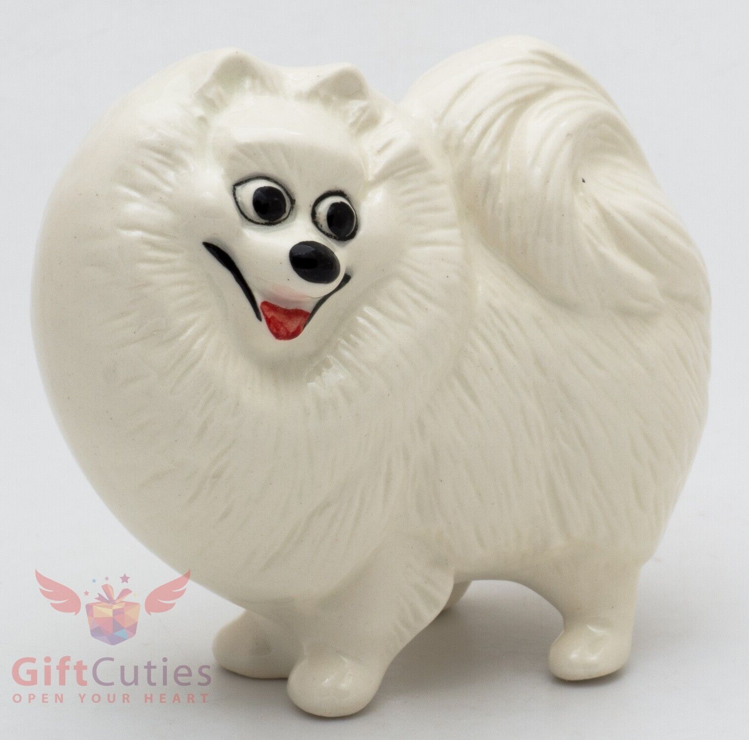 Porcelain Figurine of the white Pomeranian Spitz dog