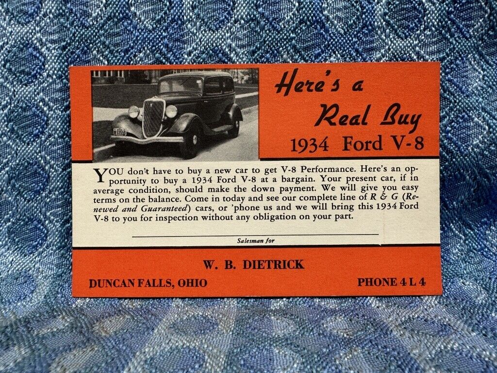 1934 Ford V-8 ORIGINAL R & G Used Car Dealer Postcard Dietrick Duncan Falls Ohio