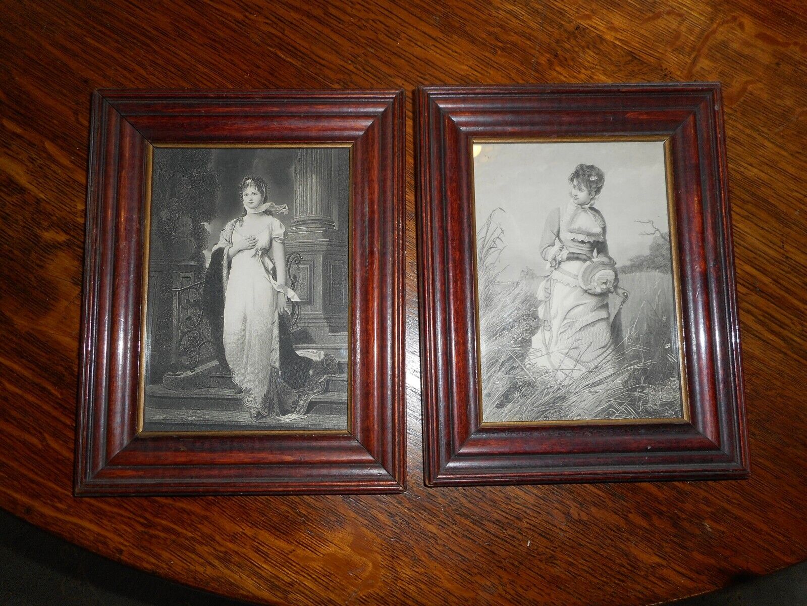 Pair of antique Victorian engravings, in lovely matched vintage wooden frames