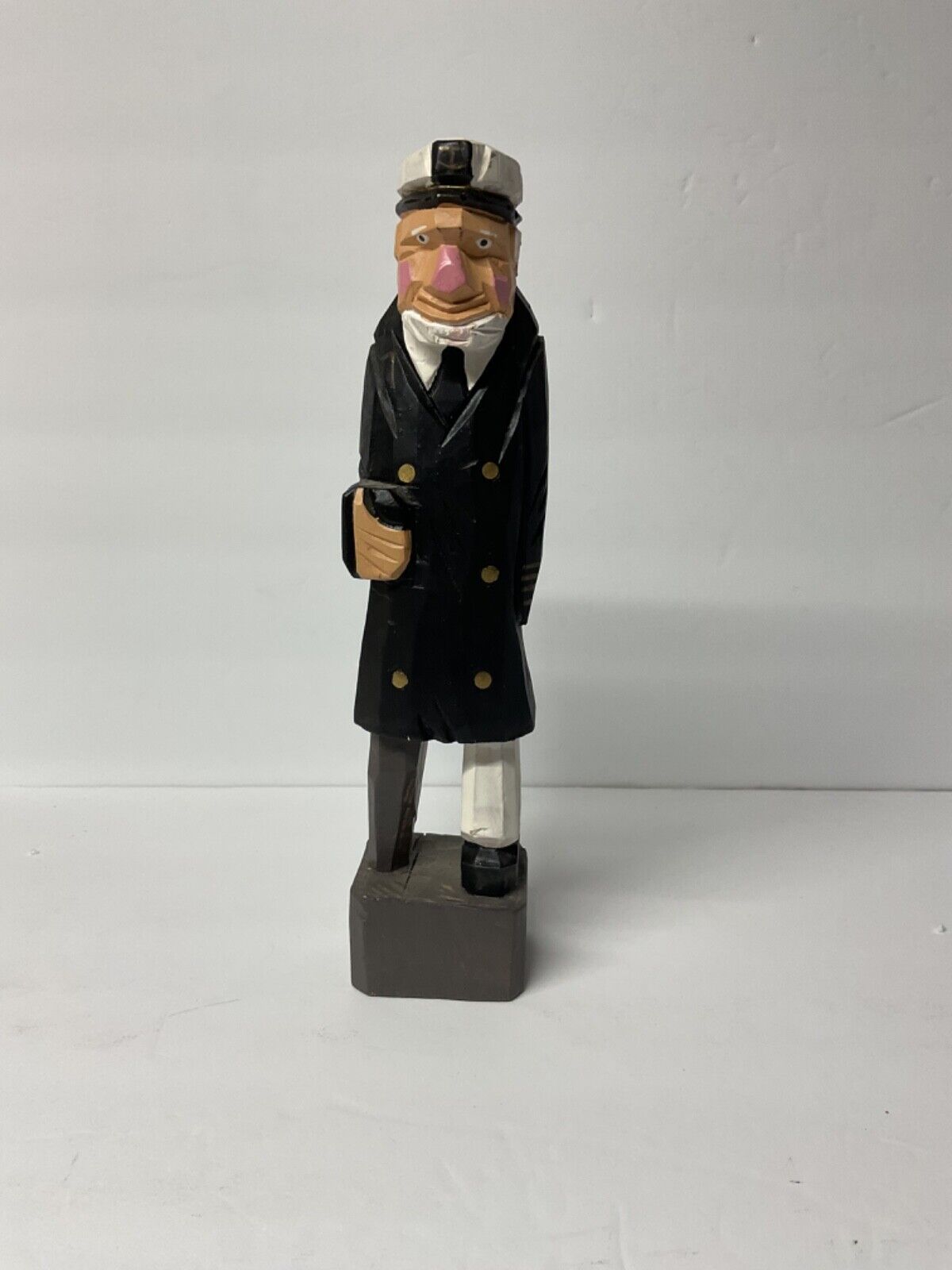 Vintage Carved Wood Sea Captain with a Peg Leg approximately 9 3/4” tall