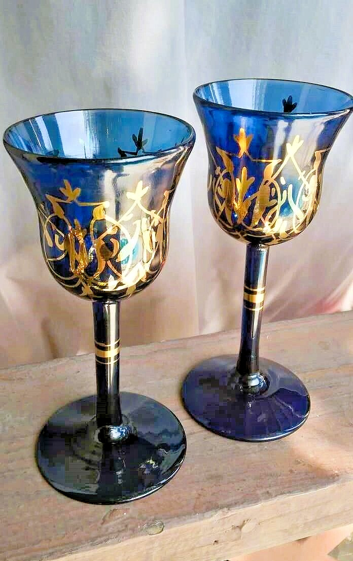 A Vintage pair of Hand-Blown Dark Peacock Blue Wine Goblets with Gold Gilding