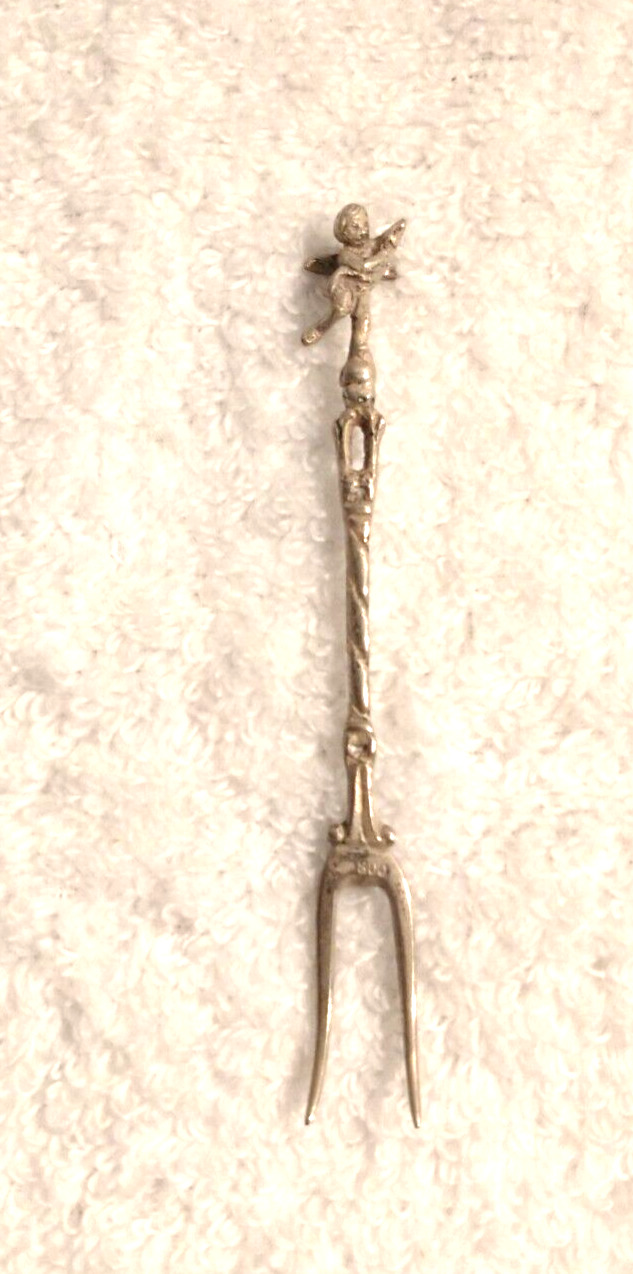 A Vintage 800 Solid Silver Cocktail Fork With 3D Cherub at Top of Handle
